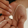 Personalised Footprint Heart Disc Bracelet, thumbnail 1 of 5