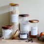 Slim Storage Jar With Acacia Wood Lid And Personalised Label, thumbnail 1 of 9