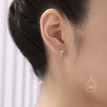 Tiny Cz Moon And Star Huggie Hoop Earrings, 2 of 12