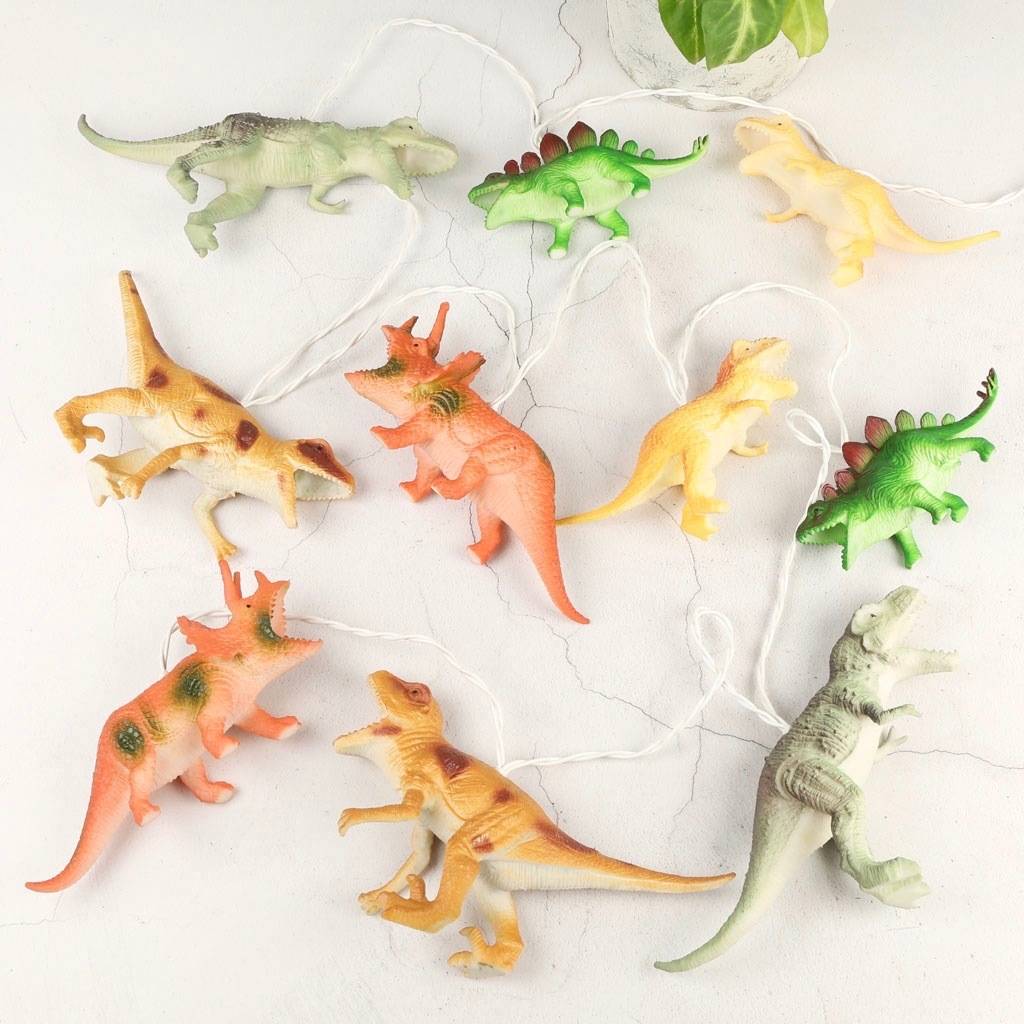 colourful dinosaur string lights by lisa angel