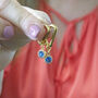 Triangle Huggie Earrings With Birthstone Detail, thumbnail 2 of 12