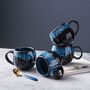 Set Of Four Reactive Glaze Mugs In Inky Black And Blue, thumbnail 2 of 4
