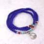 Beaded Wrap Bracelet With Peace Charm, thumbnail 1 of 6