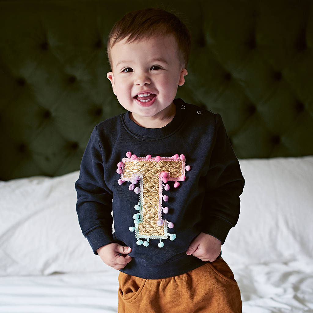 Personalised Baby Sweatshirt With Gold Letter By Zilla