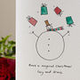 Personalised 'Juggling Snowman' Handmade Card, thumbnail 1 of 10