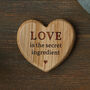 'Love Is The Secret Ingredient' Oak Heart Magnet, thumbnail 1 of 3