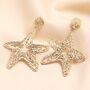 Oversized Hammered Starfish Outline Drop Earrings In Gold, thumbnail 1 of 3