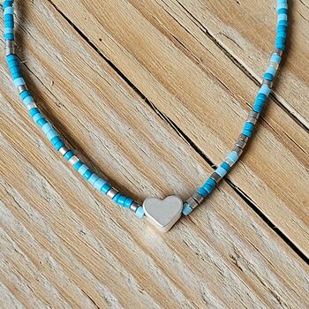 Seed Bead Bracelet In Light Blue With Heart Charm, 2 of 3