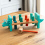 Personalised Name O Saurus Dinosaur Hammer Bench Toy, thumbnail 1 of 4