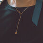 Minimalist Gold Beaded Y Necklace With Drop Charm, thumbnail 1 of 8