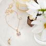 Gold Tone Rose Quartz Crystal Star Necklace, thumbnail 1 of 5