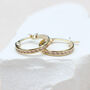 Solid Gold Cubic Zirconia Channel Set Hoop Earrings, thumbnail 1 of 3