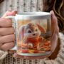 Personalised Autumn Rabbit Playing In Leaves Gift Mug, thumbnail 1 of 2
