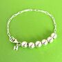 60th Birthday Sterling Silver Initial Charm Bracelet, thumbnail 1 of 3