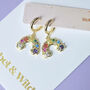 Rainbow Huggie Hoop Earrings, thumbnail 1 of 5