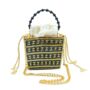 Tuparro Black And Gold Handwoven Straw Basket Bag, thumbnail 2 of 7