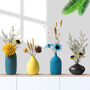 Set Of Four Small Ceramic Mini Matte Flower Vases, thumbnail 1 of 4