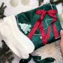 Luxury Christmas Pyjama Gift Set For Her – Festive Green Satin Pjs, Candle, Socks And Hair Bow, thumbnail 8 of 9