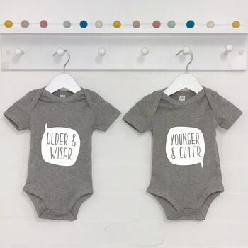 Twin Babygrow Set Older And Wiser Vs Younger And Cuter, 4 of 5