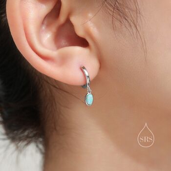 Sterling Silver Dangling Oval White Opal Hoop Earrings, 2 of 11
