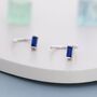 Sapphire Blue Baguette Cut Cz Huggie Hoop Earrings In Sterling Silver, thumbnail 1 of 11