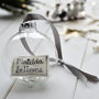 Personalised 'Believes' Glass Christmas Bauble, thumbnail 1 of 4