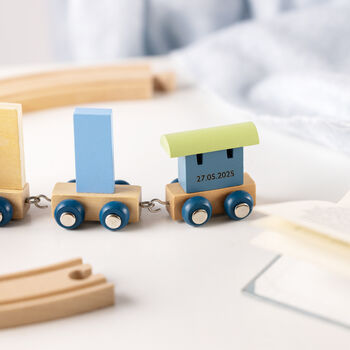 Engraved New Baby Polar Wooden Name Train, 11 of 12