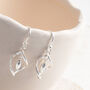 Sterling Silver Twirl Dangly Earrings, thumbnail 1 of 4
