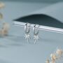 Sterling Silver Palm Tree Huggie Hoops, thumbnail 1 of 11