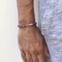 Hematite Bead Bracelet With Six Stainless Steel Crosses, thumbnail 2 of 5