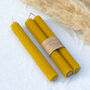 Pair Of Honey Scented Handrolled Beeswax Dinner Candles, thumbnail 2 of 9
