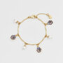 Gold Pansy And Pearl Charm Bracelet, thumbnail 1 of 9