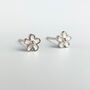 Sterling Silver Tiny Black Or White Flower Stud Earrings, thumbnail 1 of 9