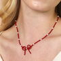 Pearl And Red Beaded Bow Pendant Necklace, thumbnail 3 of 5