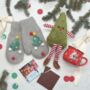 Christmas Eve Gift Box For Kids – Red Mug, Cosy Gloves, Festive Toy And Chocolate Treat, thumbnail 2 of 10