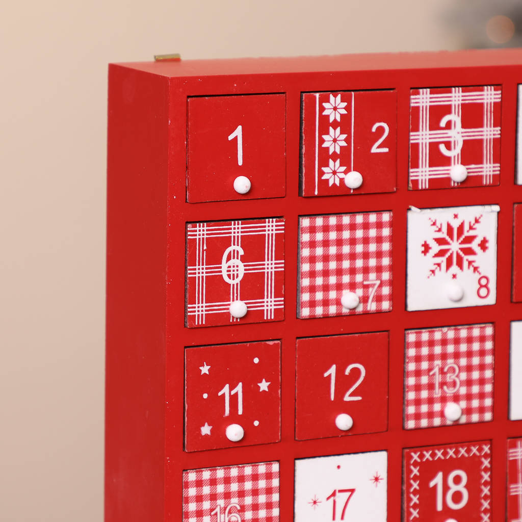 red and white festive print advent calendar by dibor