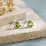Sterling Silver Genuine Peridot Trillion Cut Stud Earrings, thumbnail 1 of 12