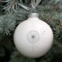 Minimalist Christmas Bauble With Dandelion, thumbnail 1 of 3
