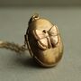 Gold Brass Oval Butterfly Locket, thumbnail 1 of 6