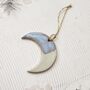 Handmade Ceramic Moon Ornament: Blue And White Glaze, Festive Tree Decoration, thumbnail 1 of 4