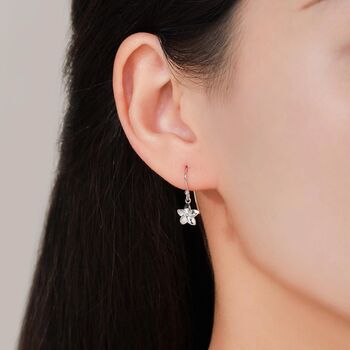 Sterling Silver Tiny Plumeria Flower Drop Hook Earrings, 6 of 11