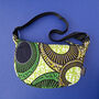 African Print Crossbody Shoulder Bag | Dumpling Sling Bag | Green Yellow, thumbnail 1 of 6
