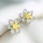 Sterling Silver Magnolia Flower Stud Earrings, thumbnail 1 of 6