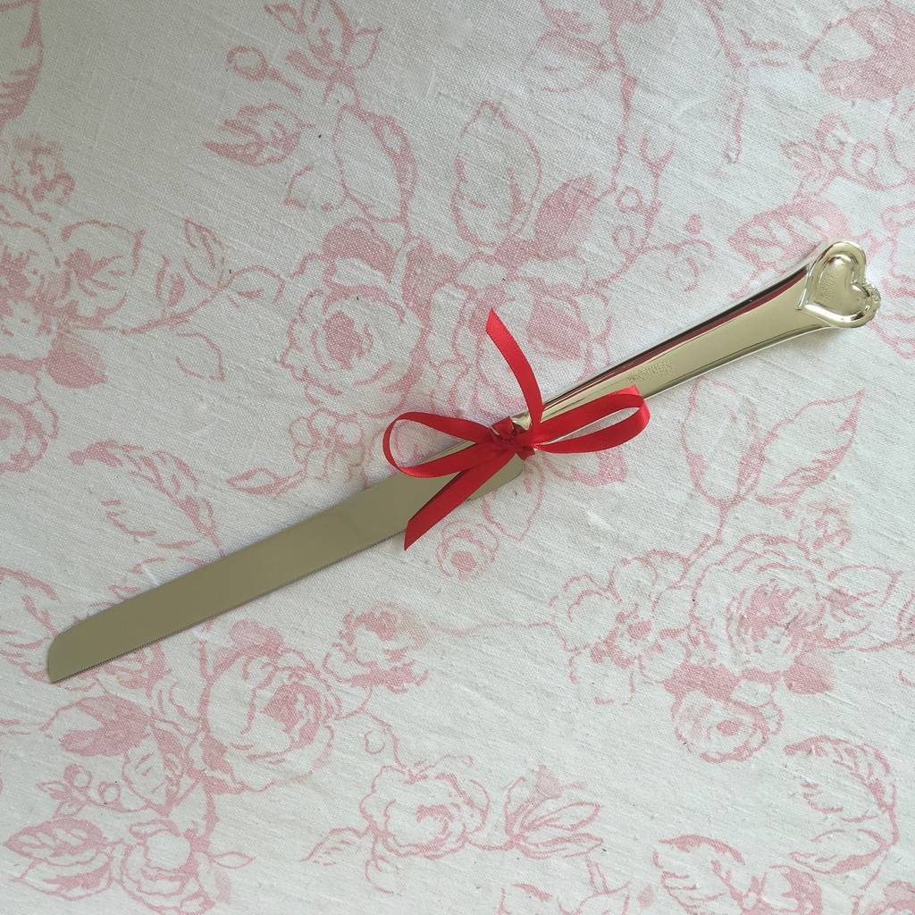 silver plated wedding  cake  knife  by chapel cards 