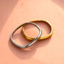 Gold Or Silver Tone Stainless Steel Clicker Bangle, thumbnail 2 of 2