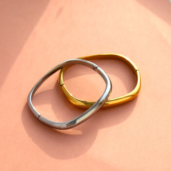 Gold Or Silver Tone Stainless Steel Clicker Bangle, 2 of 2