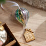 Glass Hot Air Balloon Wooden House Christmas Decoration, thumbnail 1 of 2