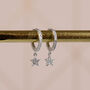 Sterling Silver And Diamante Star Huggie Earrings, thumbnail 1 of 7