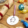 Personalised Penguin Ceramic Round Christmas Decoration, thumbnail 2 of 9