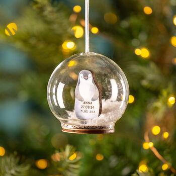 Personalised Illustrated Penguin First Christmas Snow Bauble, 5 of 7